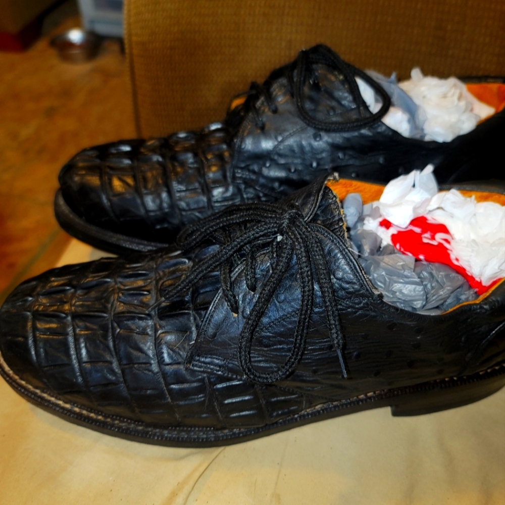 Elevate your style with these sleek Rudel loafers. Crafted from gator leather